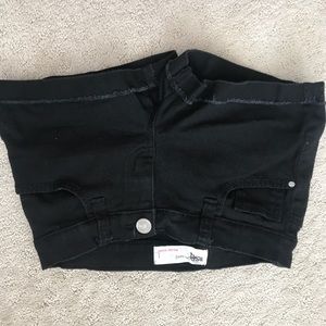 black jean shorts with folded bottoms